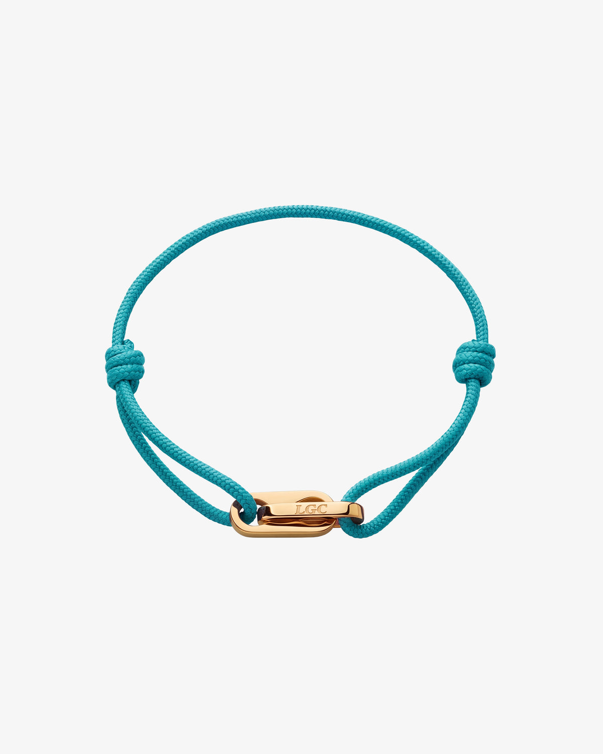 Pulsera dorada Atlantis con cordón turquesa y cierre dorado pulido.