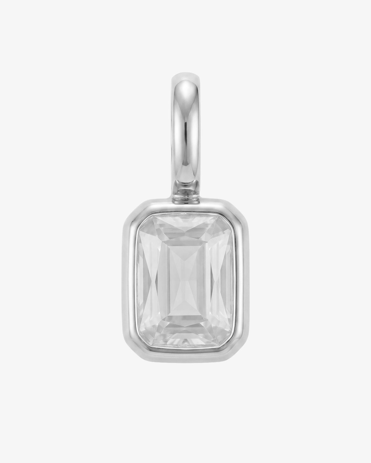 Mini Solstice charm pendant with a faceted crystal set in a silver frame.