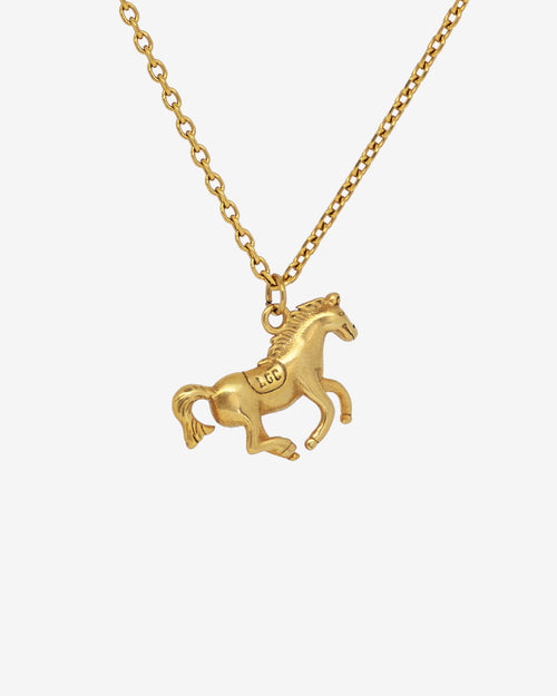 Monaco Gold Necklace featuring a detailed horse pendant and an adjustable chain