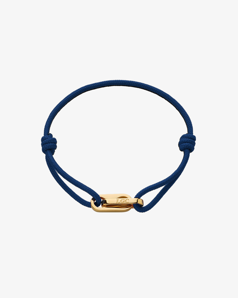 Pulsera dorada Atlantis con cordón trenzado azul y cierre dorado sobre fondo blanco