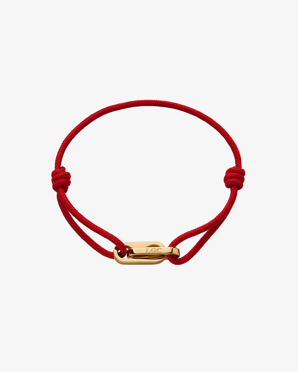 Pulsera dorada Atlantis con cordón rojo y cierre dorado en la muñeca