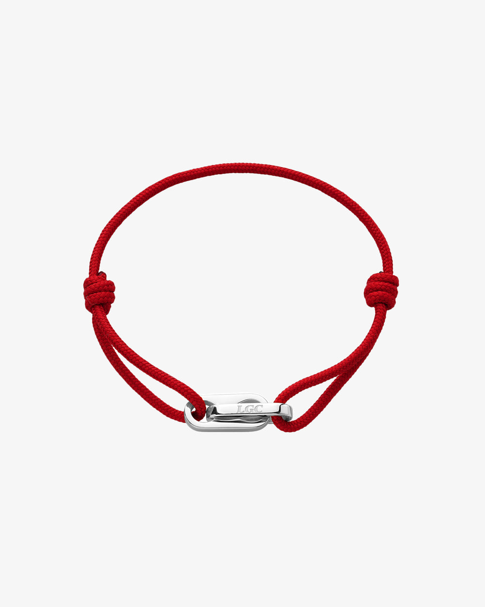 Red cord Atlantis bracelet with a silver engraved clasp on the wrist