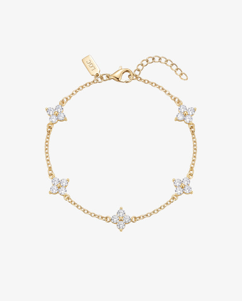 Gold Clover bracelet featuring a four leaf flower of crystals on a delicate chain with a lobster clasp