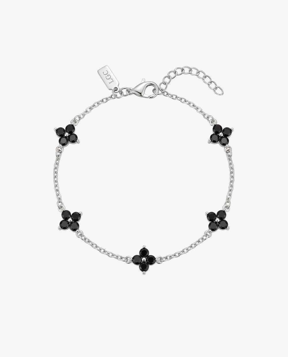 Pulsera plateada Clover con charms de flor de gema negra en delicada cadena