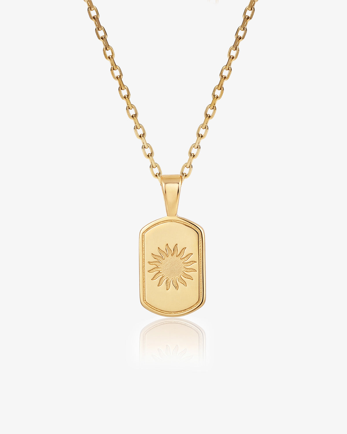 Daystar gold necklace with sunburst pendant on a gold chain.