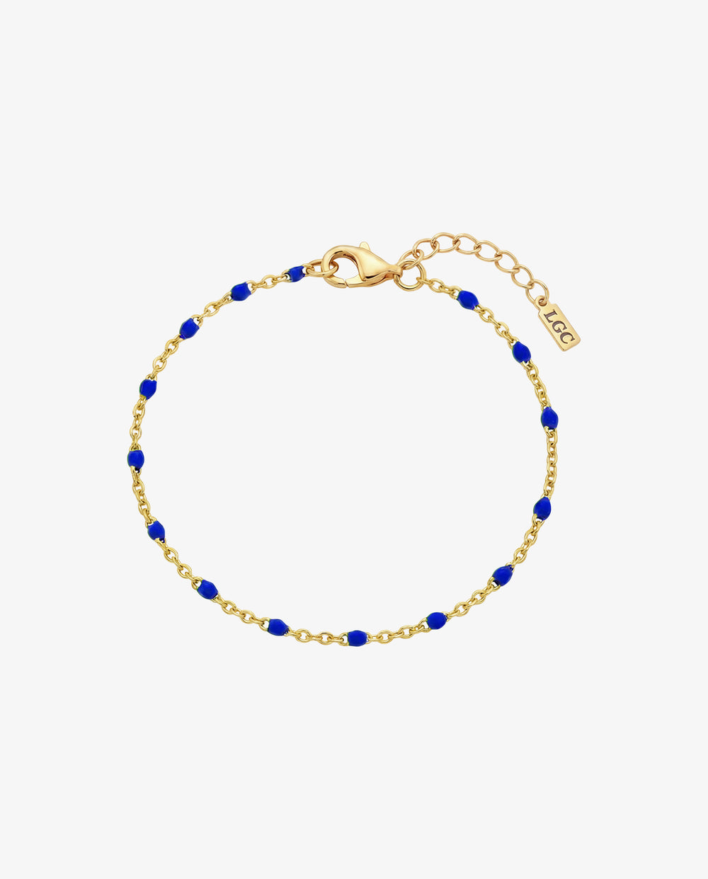 Pulsera dorada Gem con cuentas azules espaciadas en delicada cadena dorada