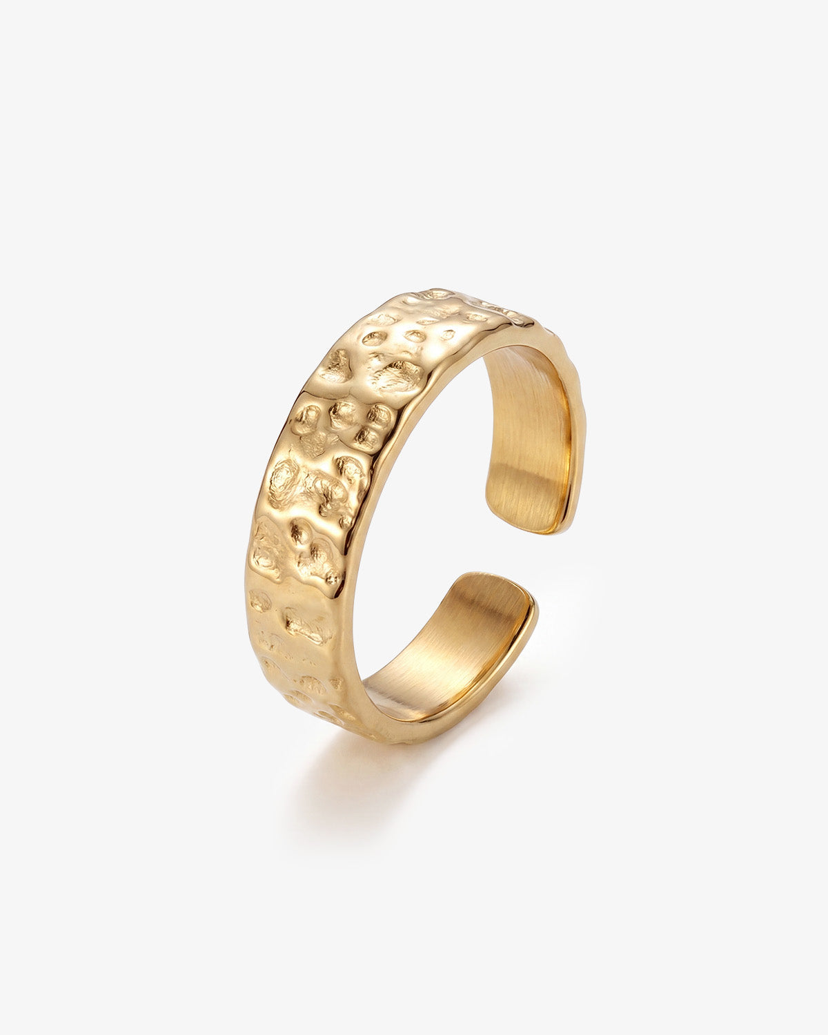Hammered wide band ring with a textured surface and open adjustable design